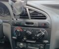 Желтый Дэу Ланос, объемом двигателя 1.5 л и пробегом 244 тыс. км за 1490 $, фото 2 на Automoto.ua