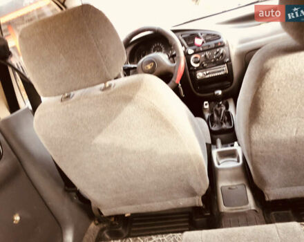 Жовтий Деу Ланос, об'ємом двигуна 1.39 л та пробігом 240 тис. км за 1700 $, фото 18 на Automoto.ua