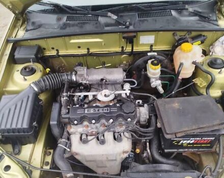 Желтый Дэу Ланос, объемом двигателя 1.5 л и пробегом 200 тыс. км за 1300 $, фото 10 на Automoto.ua