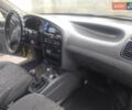 Желтый Дэу Ланос, объемом двигателя 1.5 л и пробегом 190 тыс. км за 1750 $, фото 13 на Automoto.ua