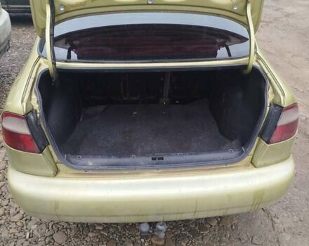 Желтый Дэу Ланос, объемом двигателя 1.5 л и пробегом 200 тыс. км за 1300 $, фото 4 на Automoto.ua