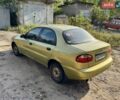 Желтый Дэу Ланос, объемом двигателя 1.5 л и пробегом 220 тыс. км за 1100 $, фото 1 на Automoto.ua