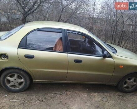 Желтый Дэу Ланос, объемом двигателя 1.5 л и пробегом 400 тыс. км за 1800 $, фото 2 на Automoto.ua