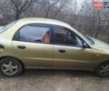 Желтый Дэу Ланос, объемом двигателя 1.5 л и пробегом 400 тыс. км за 1800 $, фото 2 на Automoto.ua