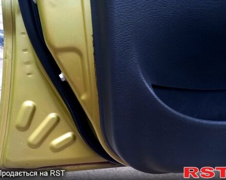 Жовтий Деу Ланос, об'ємом двигуна 1.4 л та пробігом 119 тис. км за 2450 $, фото 7 на Automoto.ua