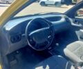 Желтый Дэу Ланос, объемом двигателя 1.5 л и пробегом 240 тыс. км за 3400 $, фото 5 на Automoto.ua