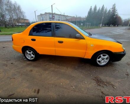 Желтый Дэу Ланос, объемом двигателя 1.4 л и пробегом 269 тыс. км за 1250 $, фото 2 на Automoto.ua