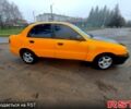 Желтый Дэу Ланос, объемом двигателя 1.4 л и пробегом 269 тыс. км за 1250 $, фото 2 на Automoto.ua