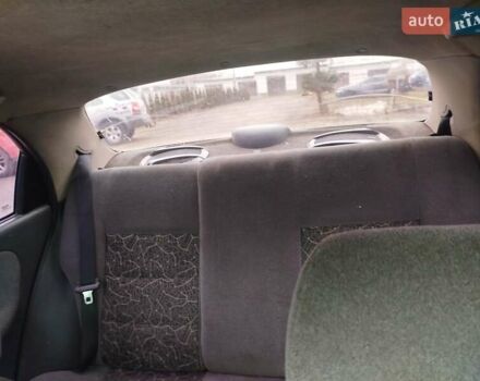 Желтый Дэу Ланос, объемом двигателя 1.5 л и пробегом 200 тыс. км за 1300 $, фото 7 на Automoto.ua