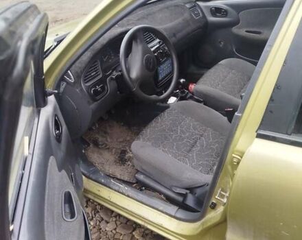 Желтый Дэу Ланос, объемом двигателя 1.5 л и пробегом 200 тыс. км за 1300 $, фото 8 на Automoto.ua