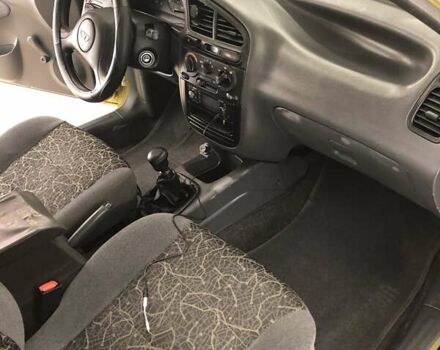Жовтий Деу Ланос, об'ємом двигуна 1.4 л та пробігом 112 тис. км за 2999 $, фото 11 на Automoto.ua
