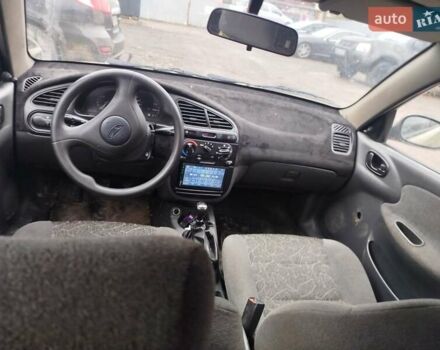 Желтый Дэу Ланос, объемом двигателя 1.5 л и пробегом 200 тыс. км за 1300 $, фото 9 на Automoto.ua