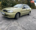 Желтый Дэу Ланос, объемом двигателя 1.5 л и пробегом 235 тыс. км за 1800 $, фото 1 на Automoto.ua