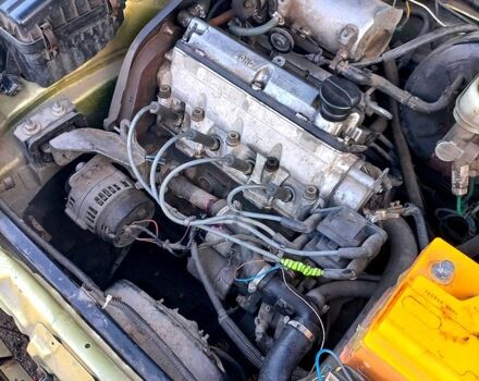 Желтый Дэу Ланос, объемом двигателя 1.4 л и пробегом 190 тыс. км за 900 $, фото 5 на Automoto.ua