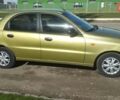 Желтый Дэу Ланос, объемом двигателя 1.5 л и пробегом 228 тыс. км за 2000 $, фото 1 на Automoto.ua