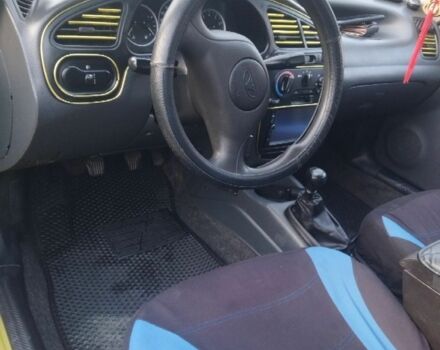 Дэу Ланос 2007 в Сторожинце на Automoto.ua Желтый Дэу Ланос, объемом двигателя 1.5 л и пробегом 349 тыс. км за 3500 $, фото 12 на Automoto.ua