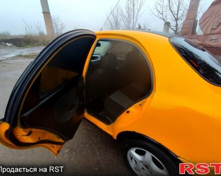 Желтый Дэу Ланос, объемом двигателя 1.4 л и пробегом 269 тыс. км за 1250 $, фото 8 на Automoto.ua