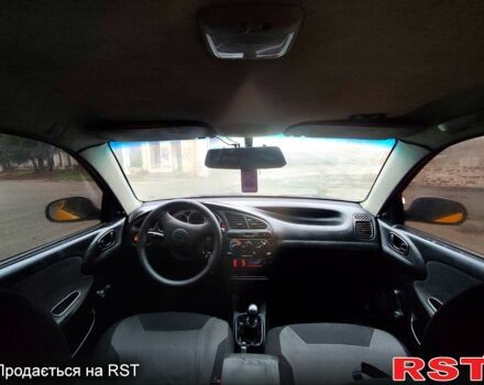 Желтый Дэу Ланос, объемом двигателя 1.4 л и пробегом 269 тыс. км за 1250 $, фото 5 на Automoto.ua