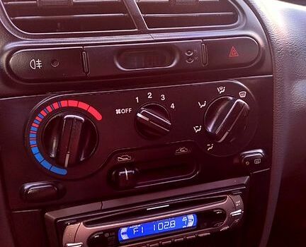 Жовтий Деу Ланос, об'ємом двигуна 1.4 л та пробігом 119 тис. км за 2450 $, фото 5 на Automoto.ua