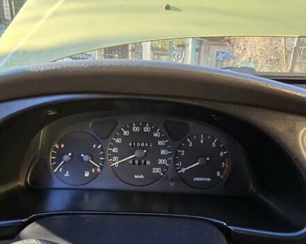 Желтый Дэу Ланос, объемом двигателя 1.5 л и пробегом 310 тыс. км за 1500 $, фото 6 на Automoto.ua