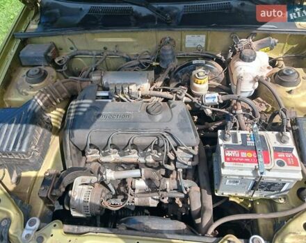 Желтый Дэу Ланос, объемом двигателя 1.39 л и пробегом 105 тыс. км за 2650 $, фото 5 на Automoto.ua