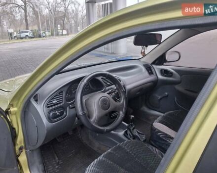 Желтый Дэу Ланос, объемом двигателя 1.49 л и пробегом 200 тыс. км за 1650 $, фото 6 на Automoto.ua