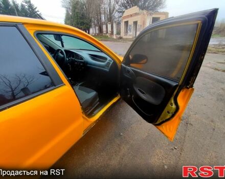 Желтый Дэу Ланос, объемом двигателя 1.4 л и пробегом 269 тыс. км за 1250 $, фото 6 на Automoto.ua