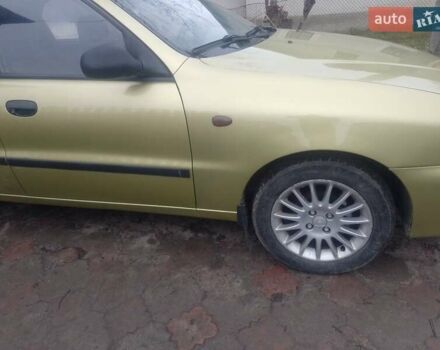Желтый Дэу Ланос, объемом двигателя 1.5 л и пробегом 190 тыс. км за 1750 $, фото 6 на Automoto.ua