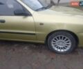 Желтый Дэу Ланос, объемом двигателя 1.5 л и пробегом 190 тыс. км за 1750 $, фото 6 на Automoto.ua