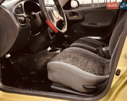 Жовтий Деу Ланос, об'ємом двигуна 1.39 л та пробігом 240 тис. км за 1700 $, фото 21 на Automoto.ua