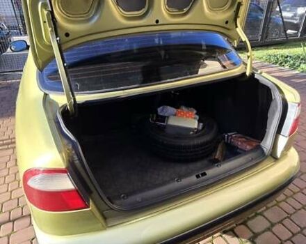 Желтый Дэу Ланос, объемом двигателя 1.5 л и пробегом 310 тыс. км за 1500 $, фото 11 на Automoto.ua