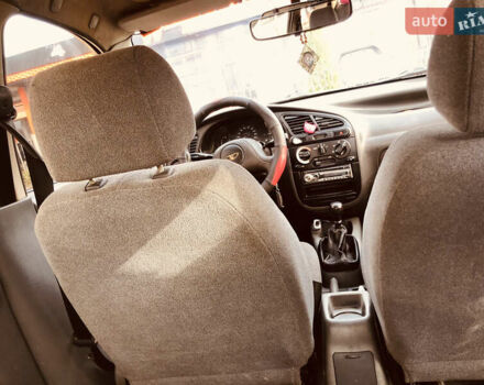 Жовтий Деу Ланос, об'ємом двигуна 1.39 л та пробігом 240 тис. км за 1700 $, фото 17 на Automoto.ua