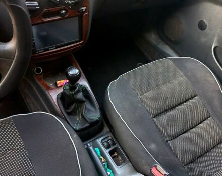 Желтый Дэу Ланос, объемом двигателя 1.4 л и пробегом 190 тыс. км за 900 $, фото 2 на Automoto.ua