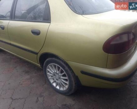 Желтый Дэу Ланос, объемом двигателя 1.5 л и пробегом 190 тыс. км за 1750 $, фото 3 на Automoto.ua