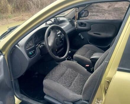 Жовтий Деу Ланос, об'ємом двигуна 1.5 л та пробігом 200 тис. км за 1100 $, фото 13 на Automoto.ua