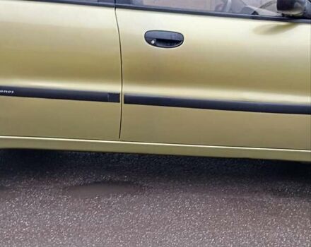 Желтый Дэу Ланос, объемом двигателя 1.39 л и пробегом 195 тыс. км за 2200 $, фото 7 на Automoto.ua