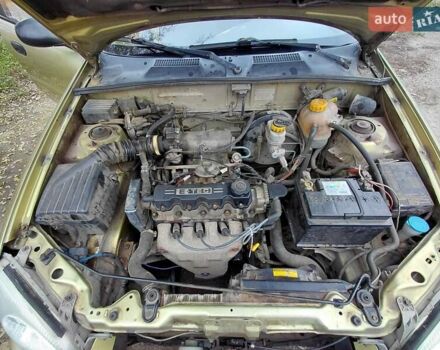 Желтый Дэу Ланос, объемом двигателя 1.5 л и пробегом 250 тыс. км за 1700 $, фото 6 на Automoto.ua