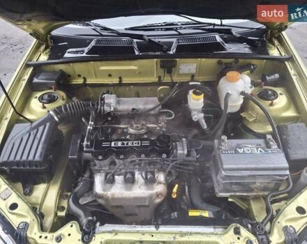Желтый Дэу Ланос, объемом двигателя 1.49 л и пробегом 200 тыс. км за 1650 $, фото 9 на Automoto.ua