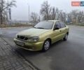 Желтый Дэу Ланос, объемом двигателя 1.49 л и пробегом 200 тыс. км за 1650 $, фото 1 на Automoto.ua