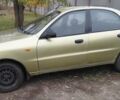 Желтый Дэу Ланос, объемом двигателя 1.5 л и пробегом 250 тыс. км за 1700 $, фото 1 на Automoto.ua