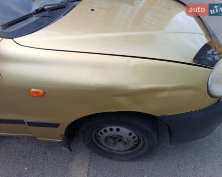 Желтый Дэу Ланос, объемом двигателя 1.5 л и пробегом 244 тыс. км за 1490 $, фото 1 на Automoto.ua