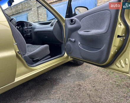 Жовтий Деу Ланос, об'ємом двигуна 1.4 л та пробігом 64 тис. км за 2550 $, фото 11 на Automoto.ua