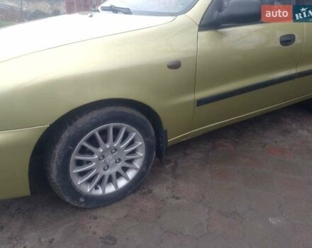 Желтый Дэу Ланос, объемом двигателя 1.5 л и пробегом 190 тыс. км за 1750 $, фото 2 на Automoto.ua