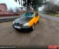 Желтый Дэу Ланос, объемом двигателя 1.4 л и пробегом 269 тыс. км за 1250 $, фото 1 на Automoto.ua