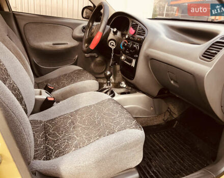 Жовтий Деу Ланос, об'ємом двигуна 1.39 л та пробігом 240 тис. км за 1700 $, фото 14 на Automoto.ua