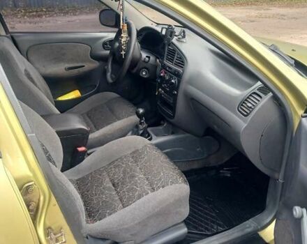 Жовтий Деу Ланос, об'ємом двигуна 1.5 л та пробігом 200 тис. км за 1100 $, фото 9 на Automoto.ua