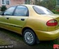 Желтый Дэу Ланос, объемом двигателя 1.4 л и пробегом 99 тыс. км за 1150 $, фото 3 на Automoto.ua