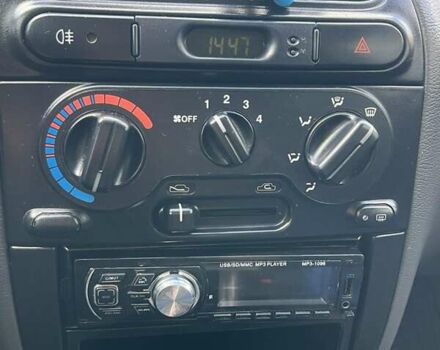 Желтый Дэу Ланос, объемом двигателя 1.5 л и пробегом 89 тыс. км за 2500 $, фото 11 на Automoto.ua