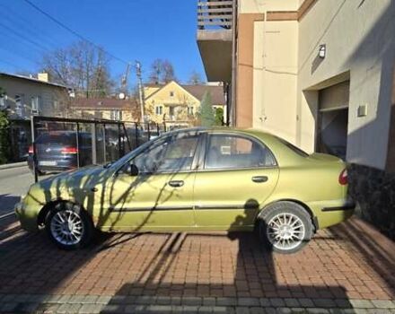 Желтый Дэу Ланос, объемом двигателя 1.5 л и пробегом 310 тыс. км за 1500 $, фото 4 на Automoto.ua