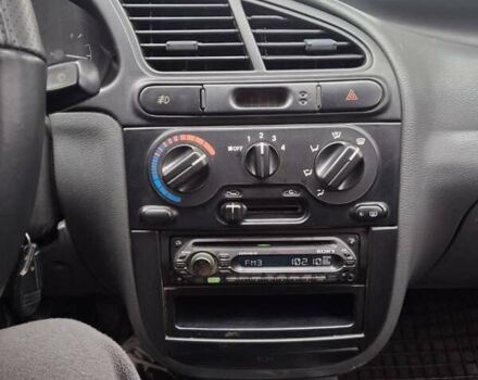 Желтый Дэу Ланос, объемом двигателя 1.49 л и пробегом 200 тыс. км за 1650 $, фото 7 на Automoto.ua